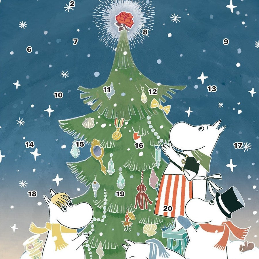 Moomin advent calendar: the Moomins decorating a Christmas tree in the snow